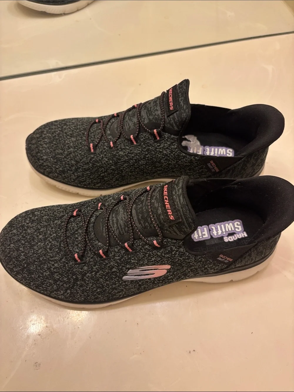 Skechers Men's Black Knit Slip-On Sneakers with Pink Highlights